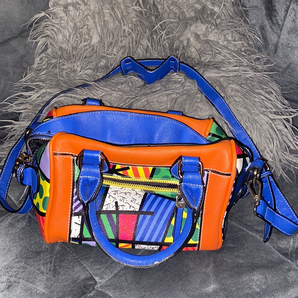 Cross body multi colored handbag
